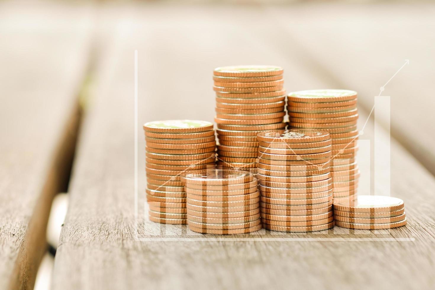 Coins stack with graph. Stock funding or money saving. Business and financial banking concept. Chart for financial investment concept. photo