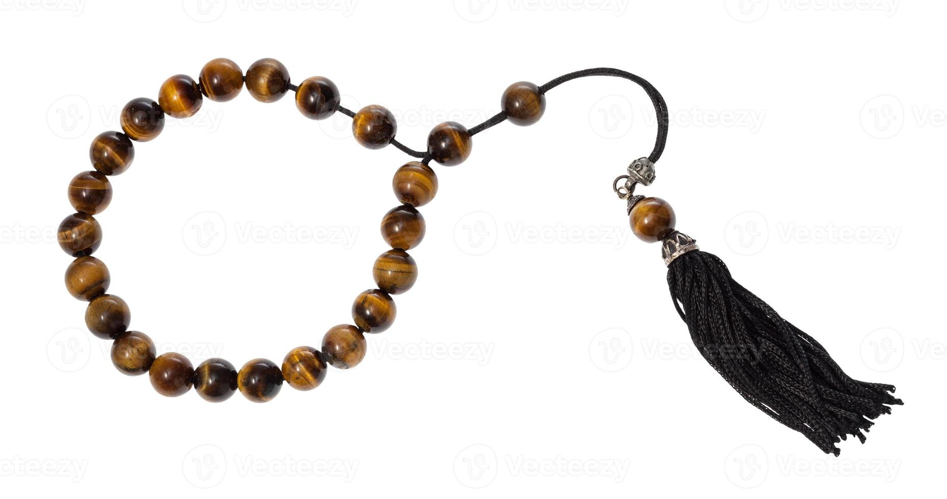 worry beads from tiger's eye gemstones isolated photo