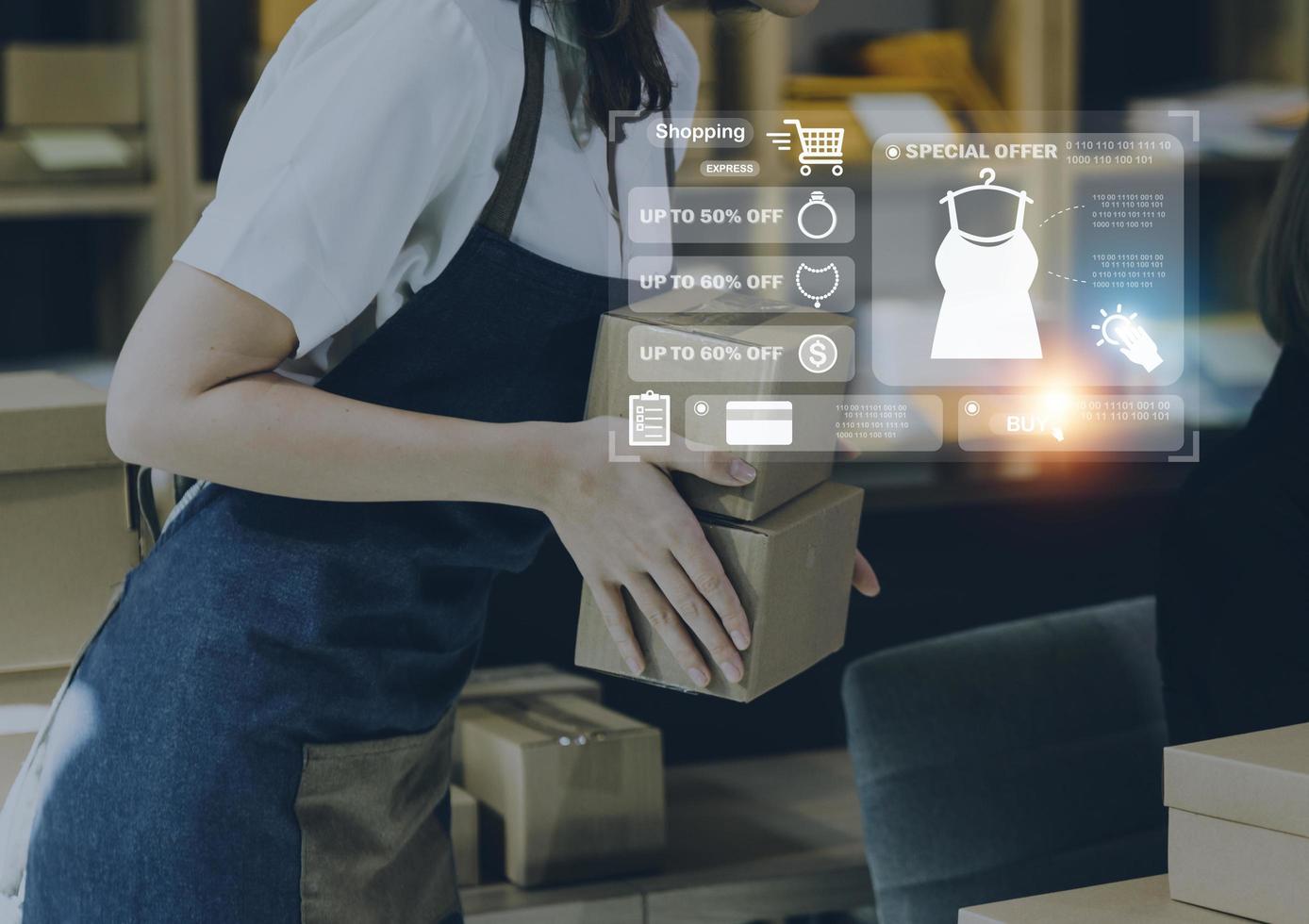 Attractive Asian SME business woman working at home office. online shopping concept photo