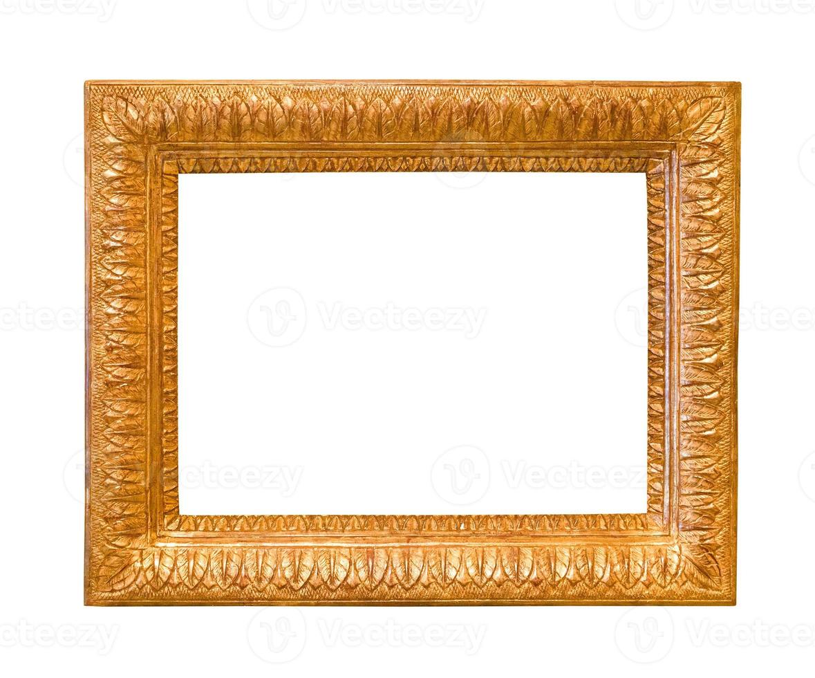 old wide carved wooden picture frame isolated photo