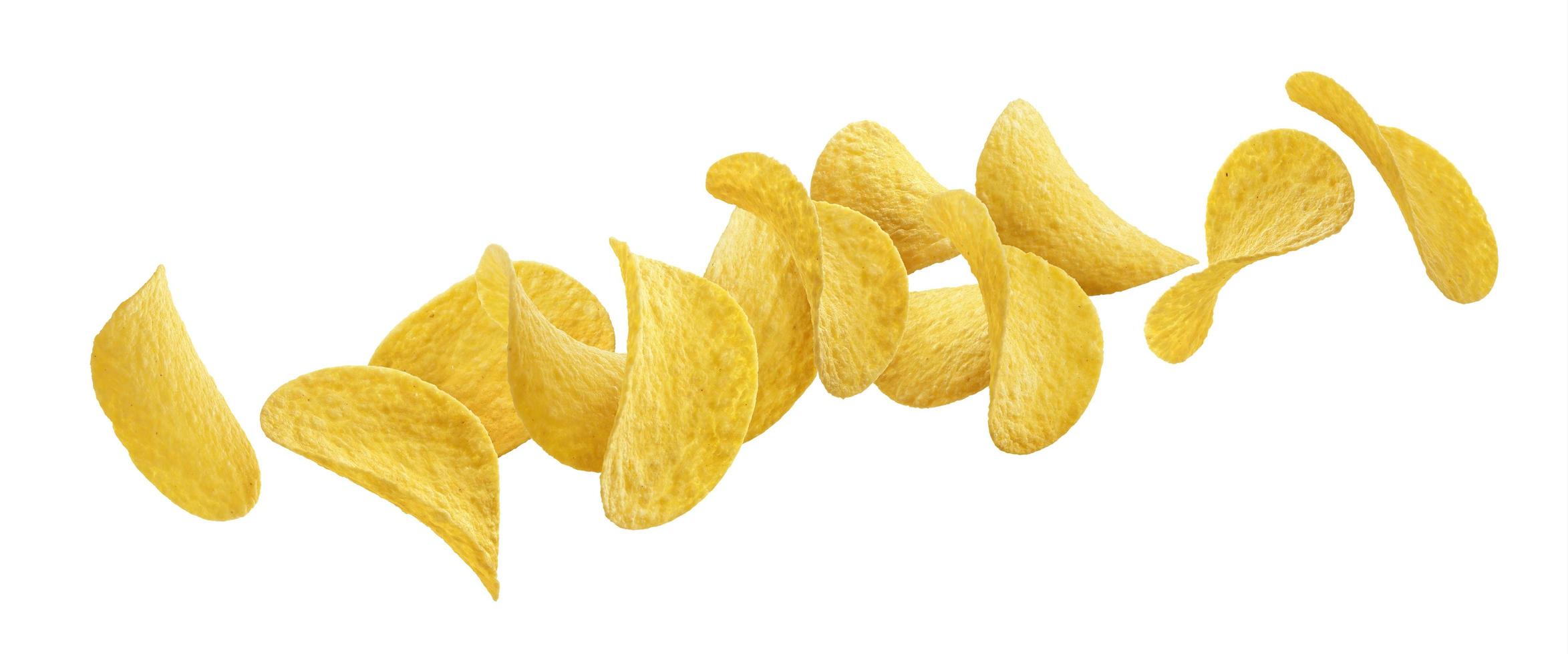 Falling potato chips isolated on white and black backgrounds photo