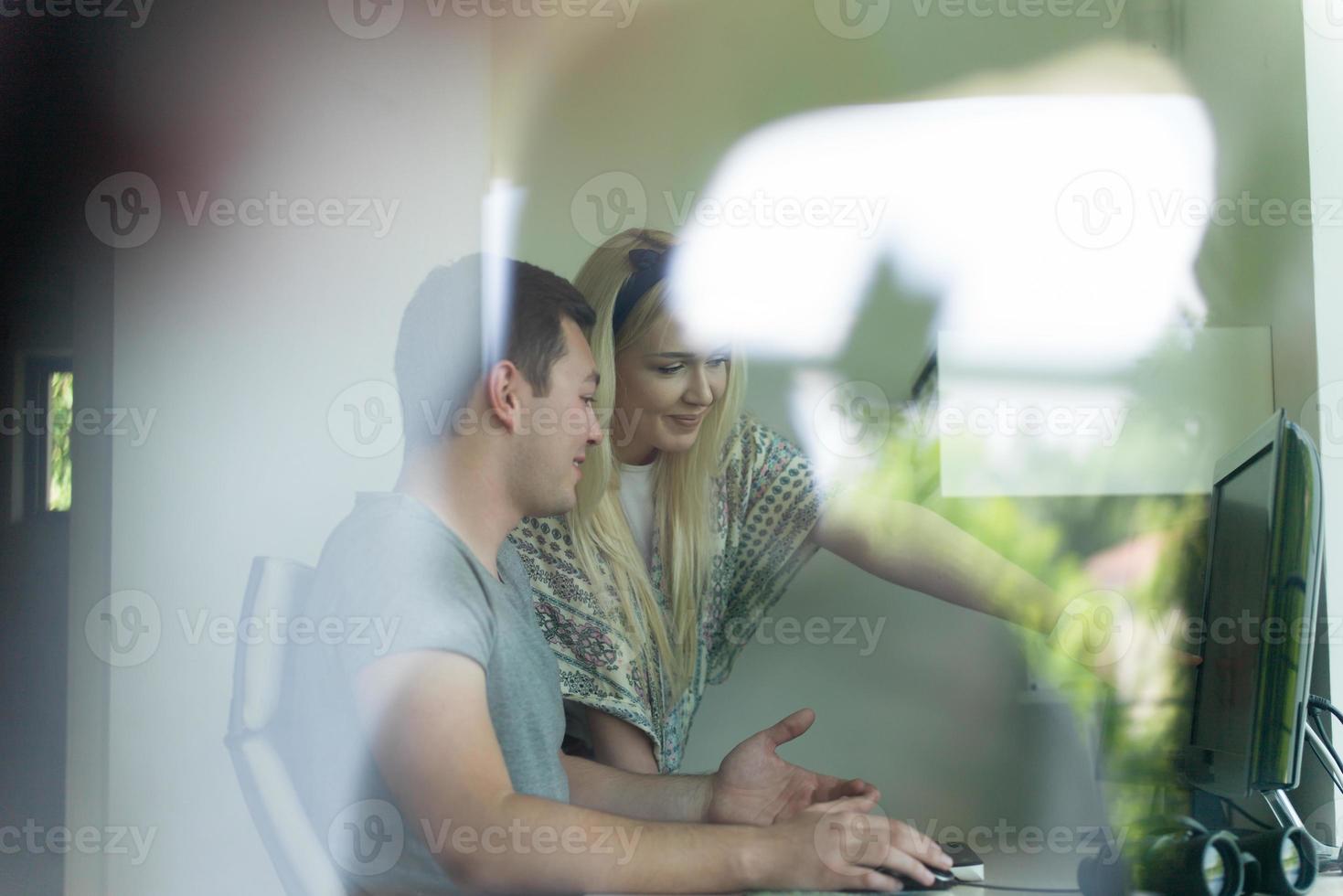 man and woman operators of security systems photo