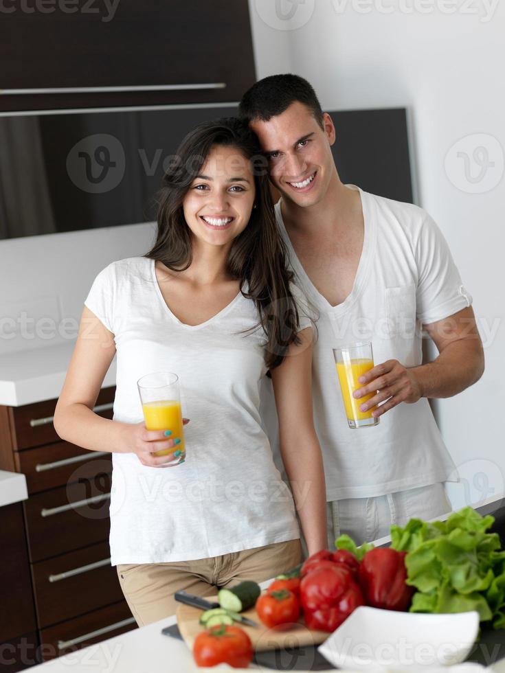 happy young couple in kicthen photo