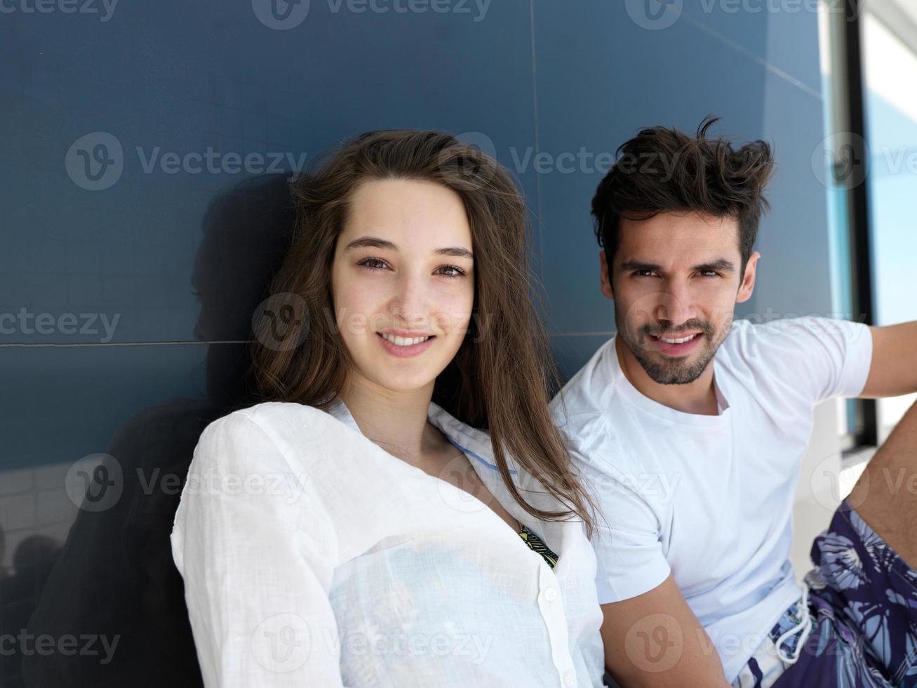 young couple making selfie together at home photo