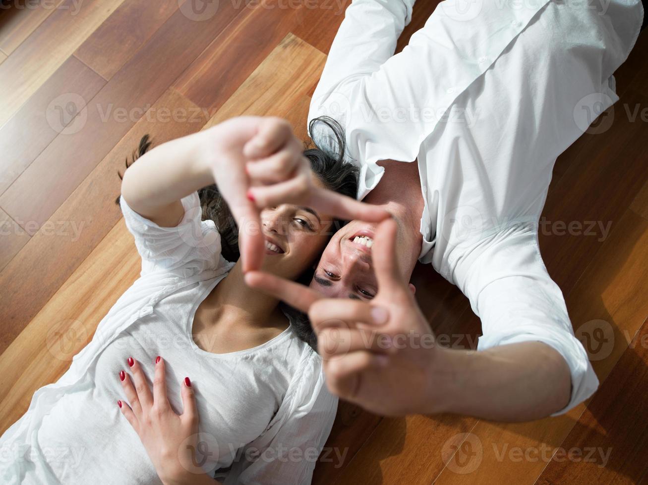 relaxed young couple at home photo