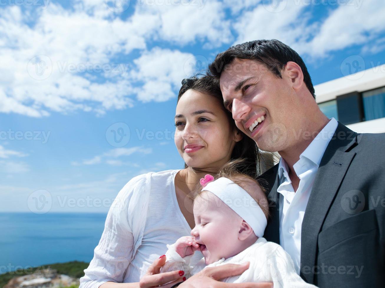happy young family at home photo