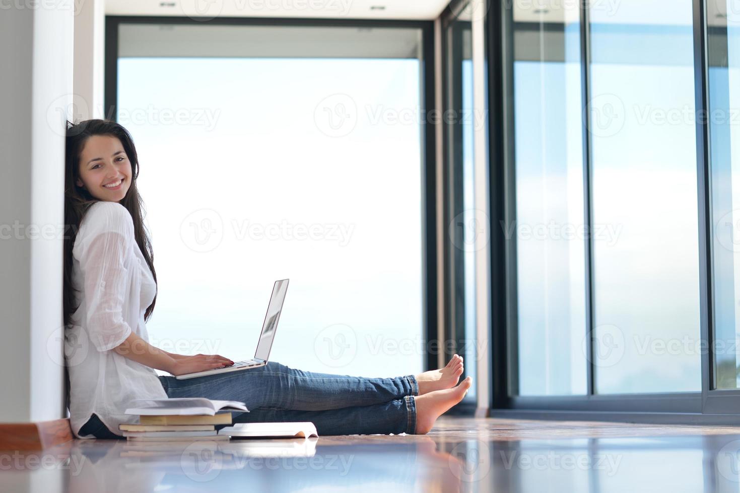 relaxed young woman at home photo