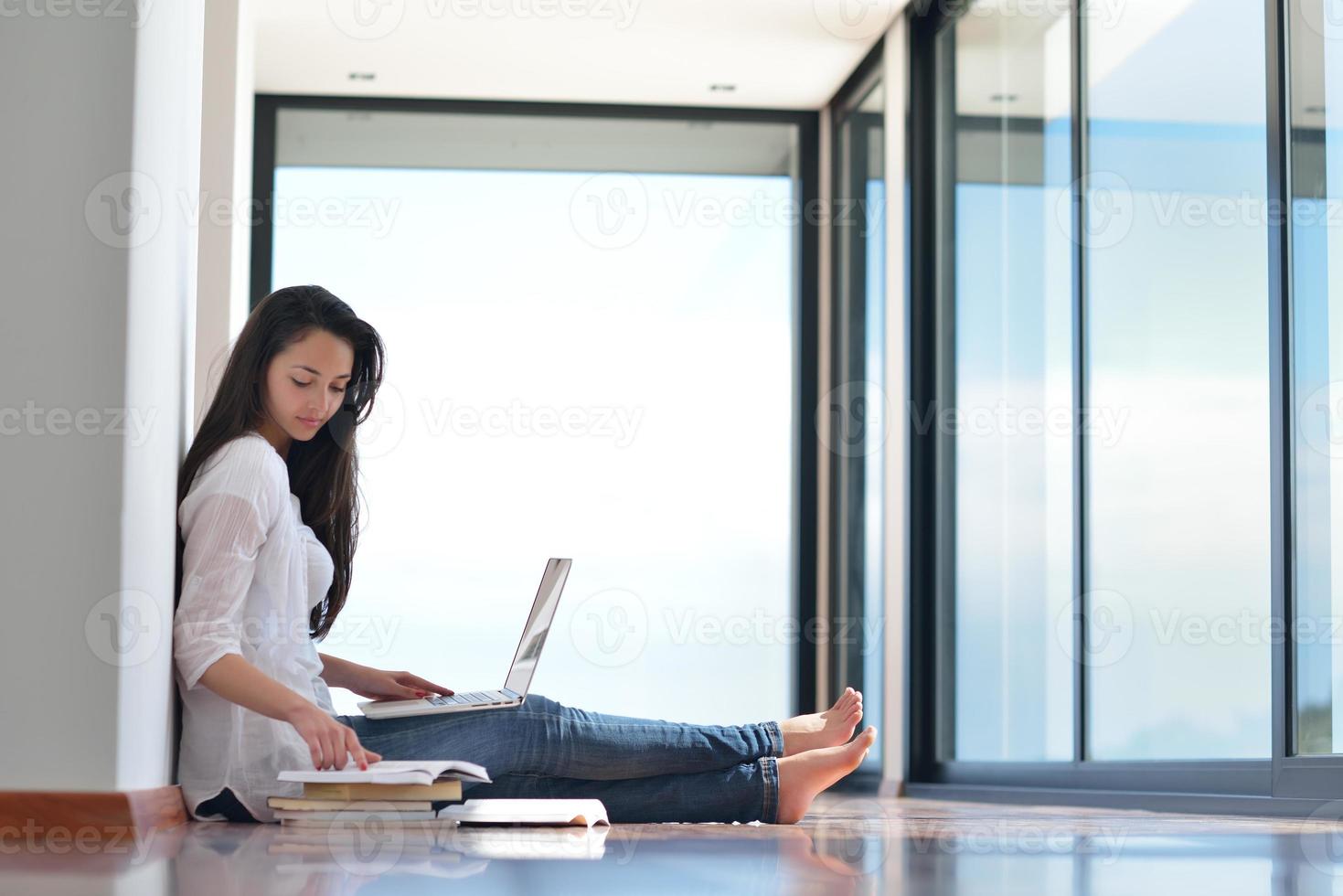relaxed young woman at home photo