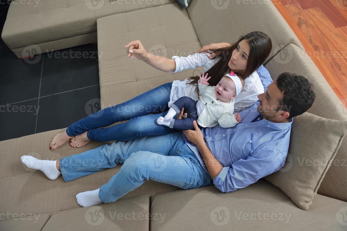 happy young family at home photo