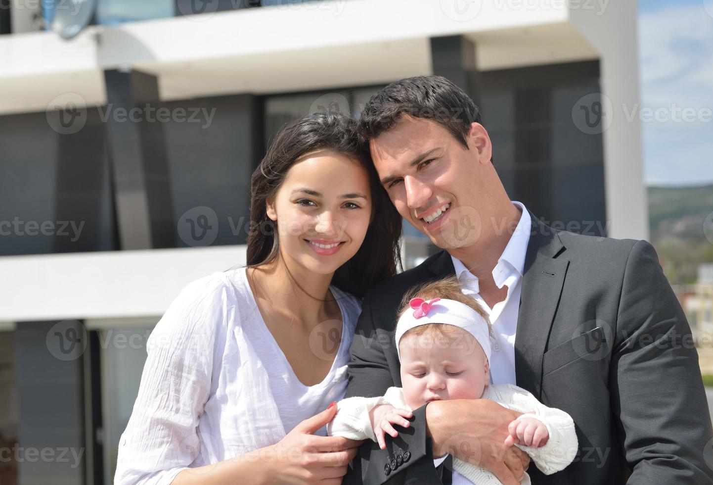 happy young family at home photo