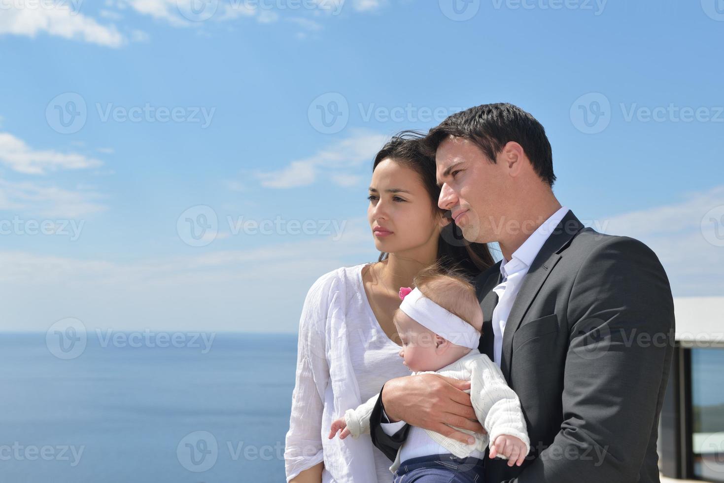happy young family at home photo