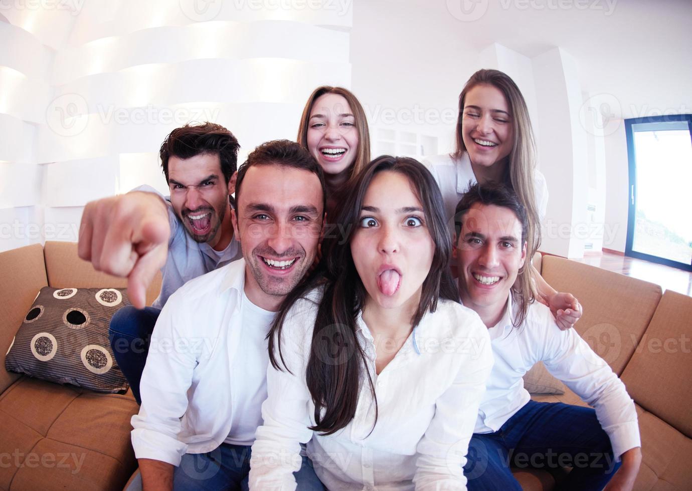 group of friends taking selfie photo