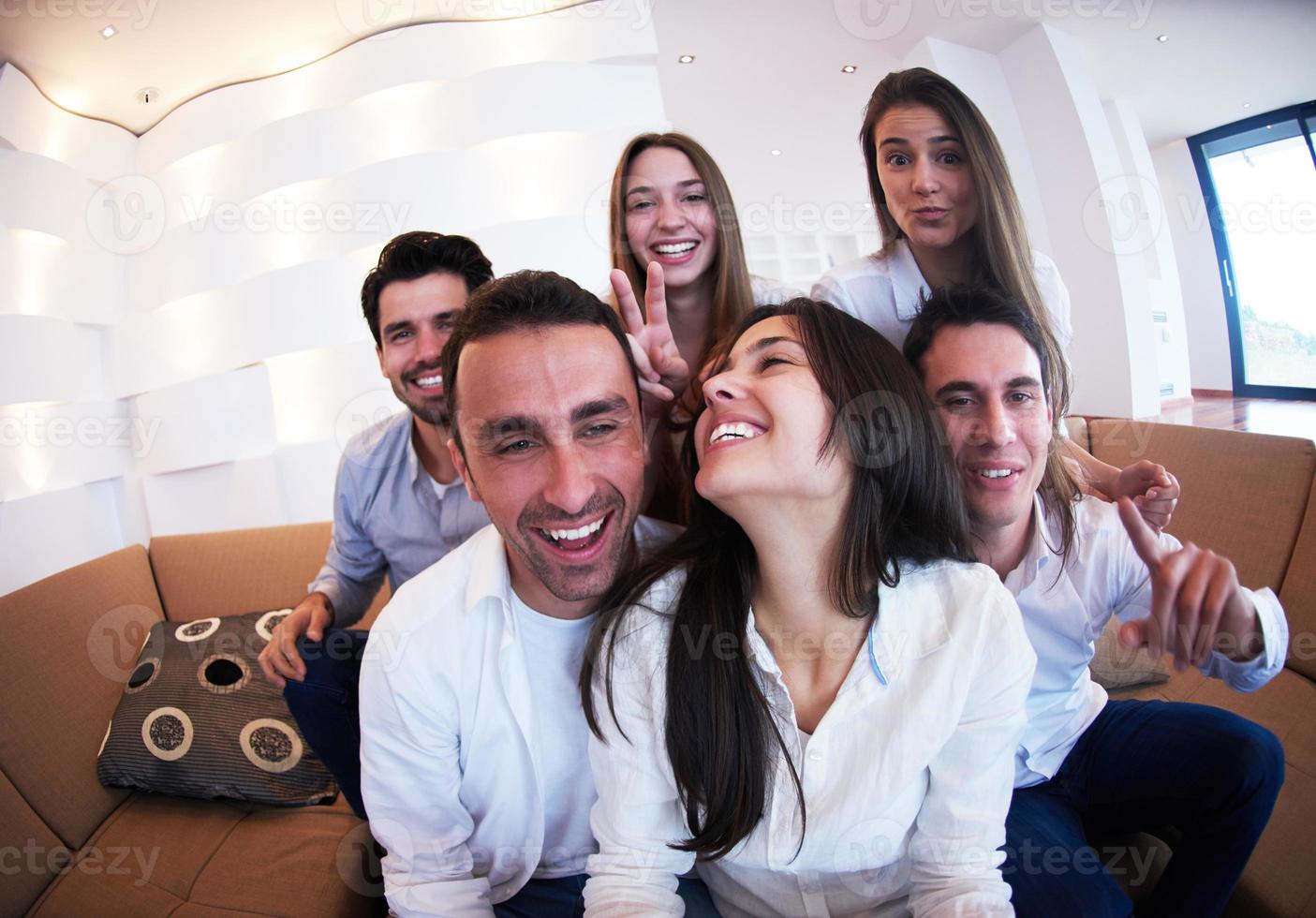 group of friends taking selfie photo