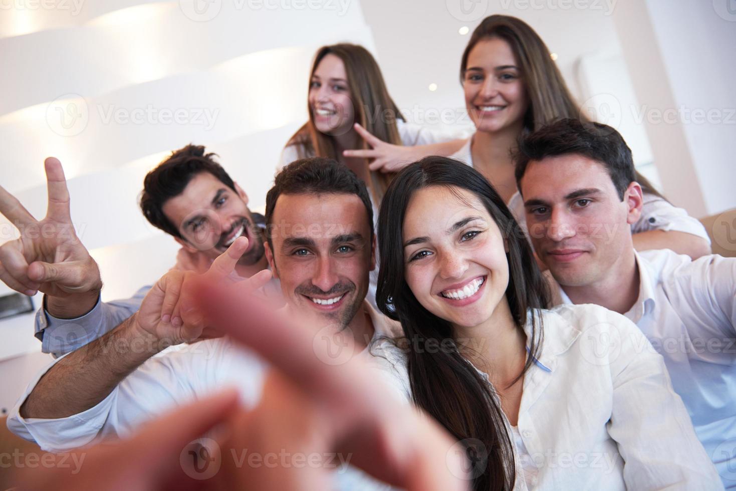 group of friends taking selfie photo