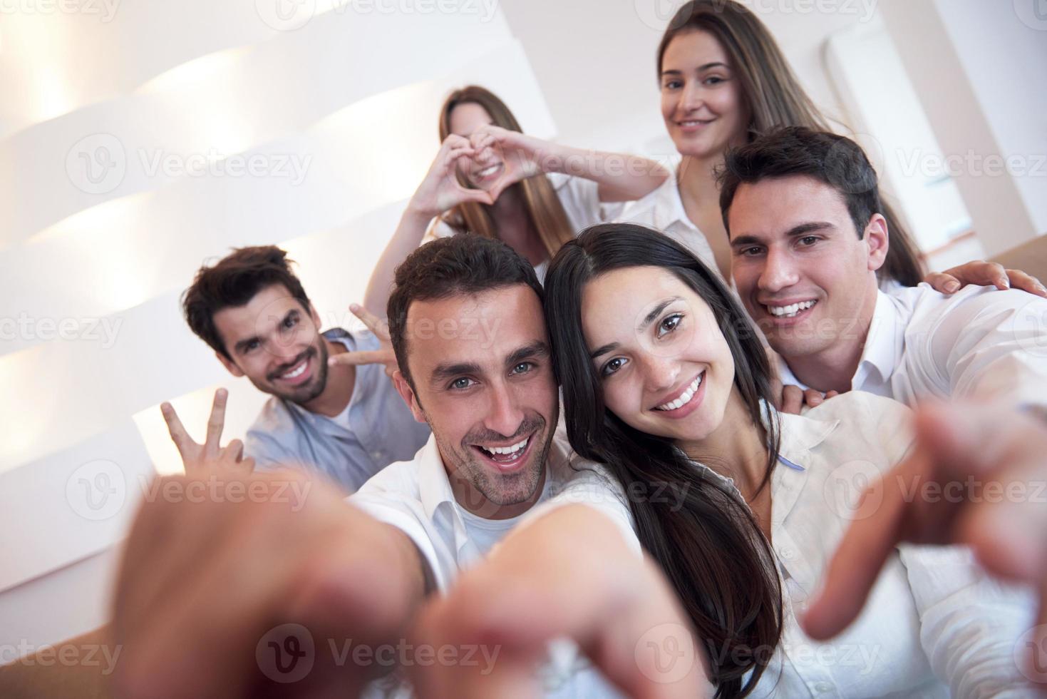 group of friends taking selfie photo