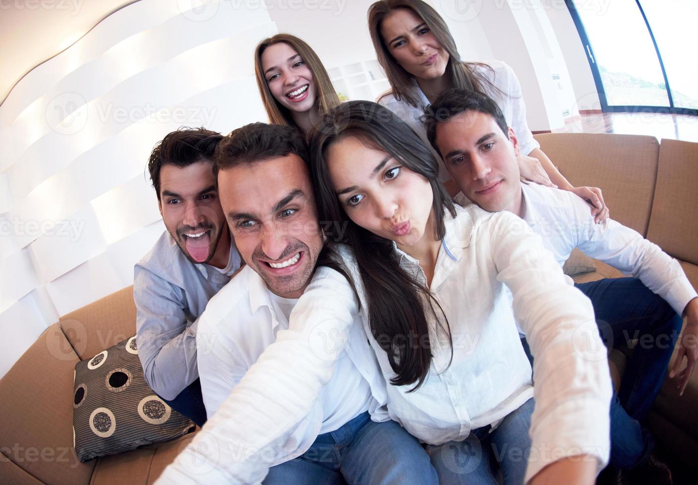 group of friends taking selfie photo