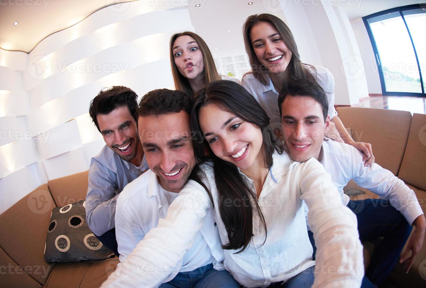 group of friends taking selfie photo