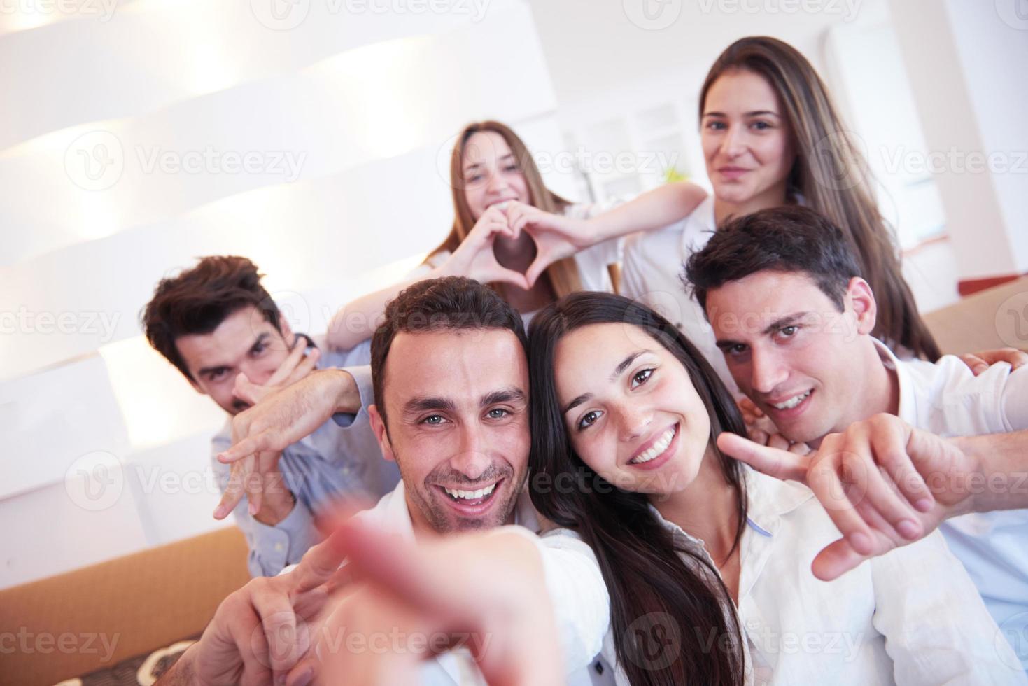 group of friends taking selfie photo