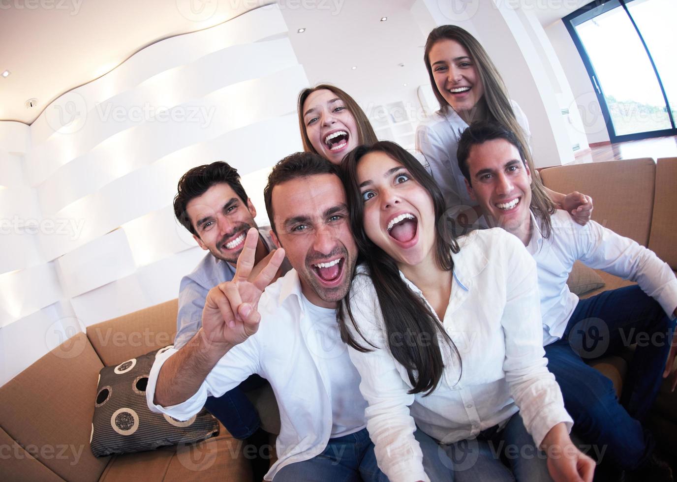 group of friends taking selfie photo