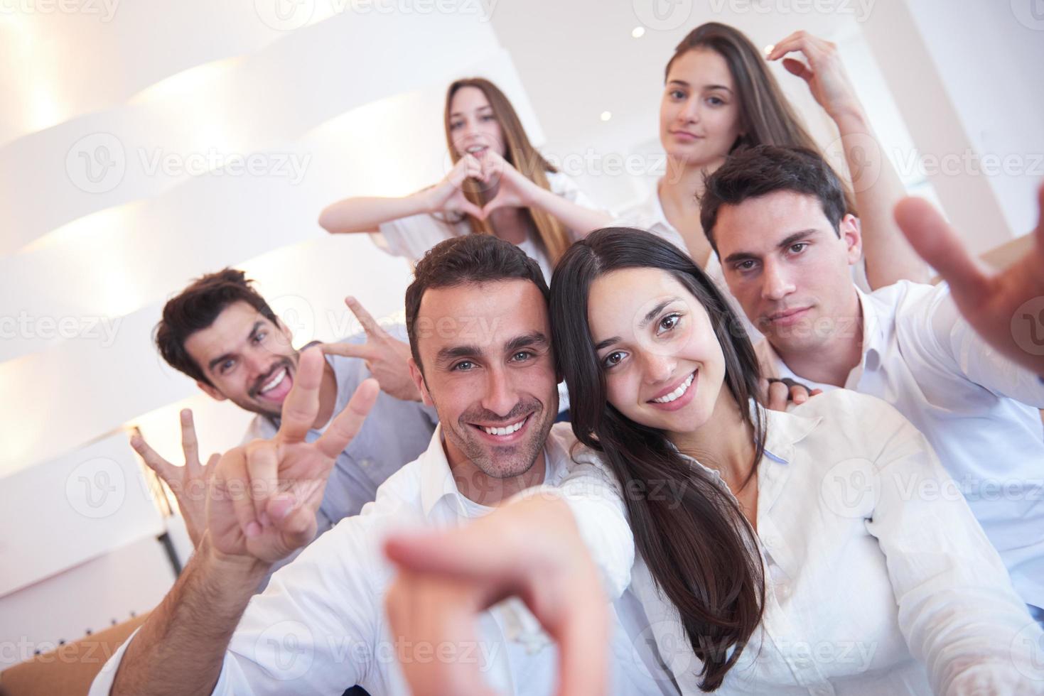 group of friends taking selfie photo