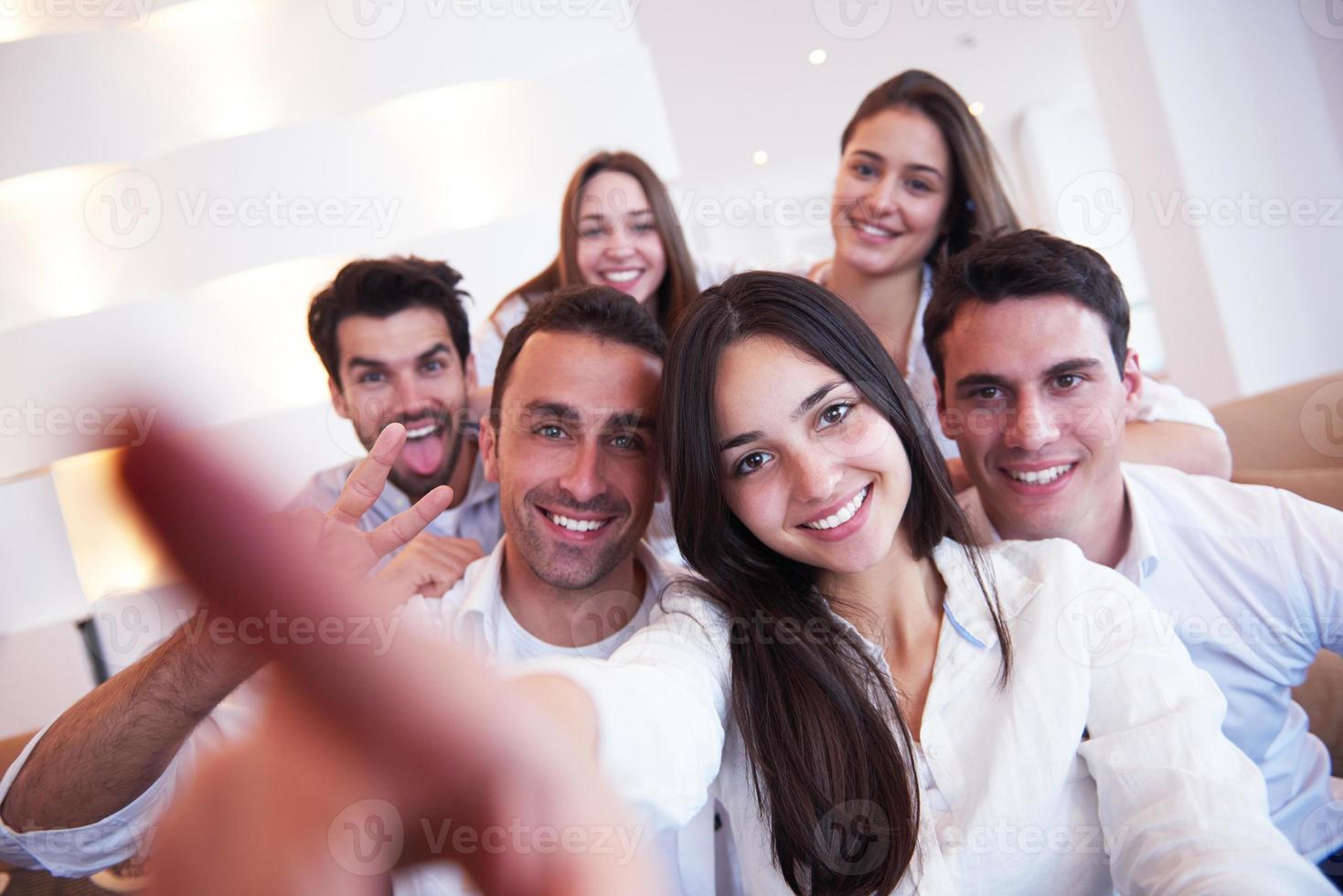 group of friends taking selfie photo