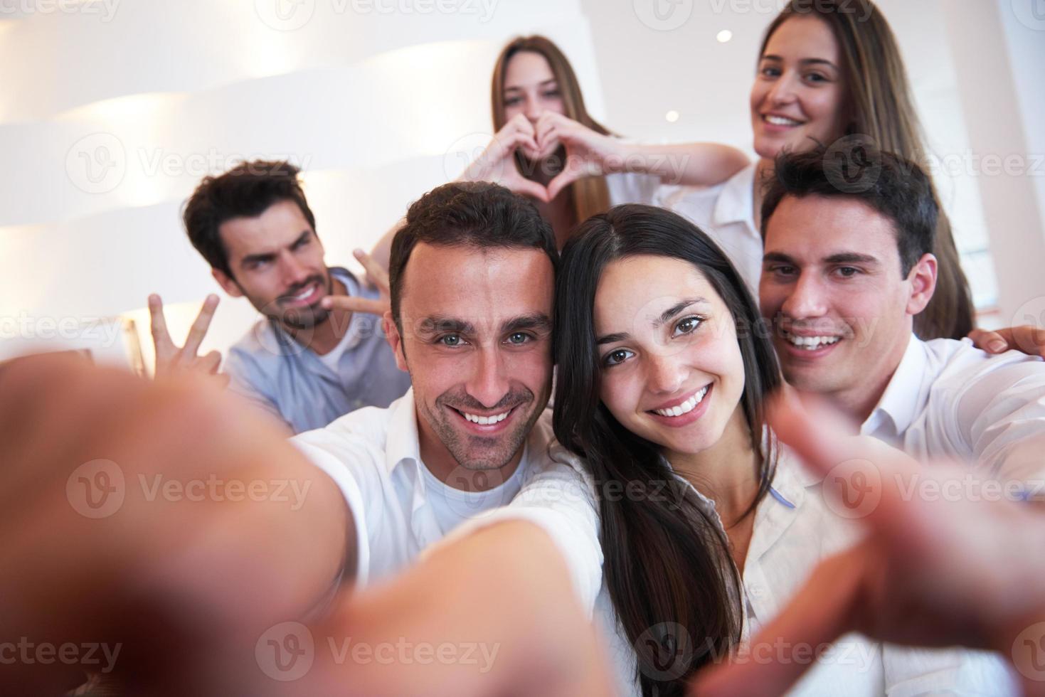 group of friends taking selfie photo