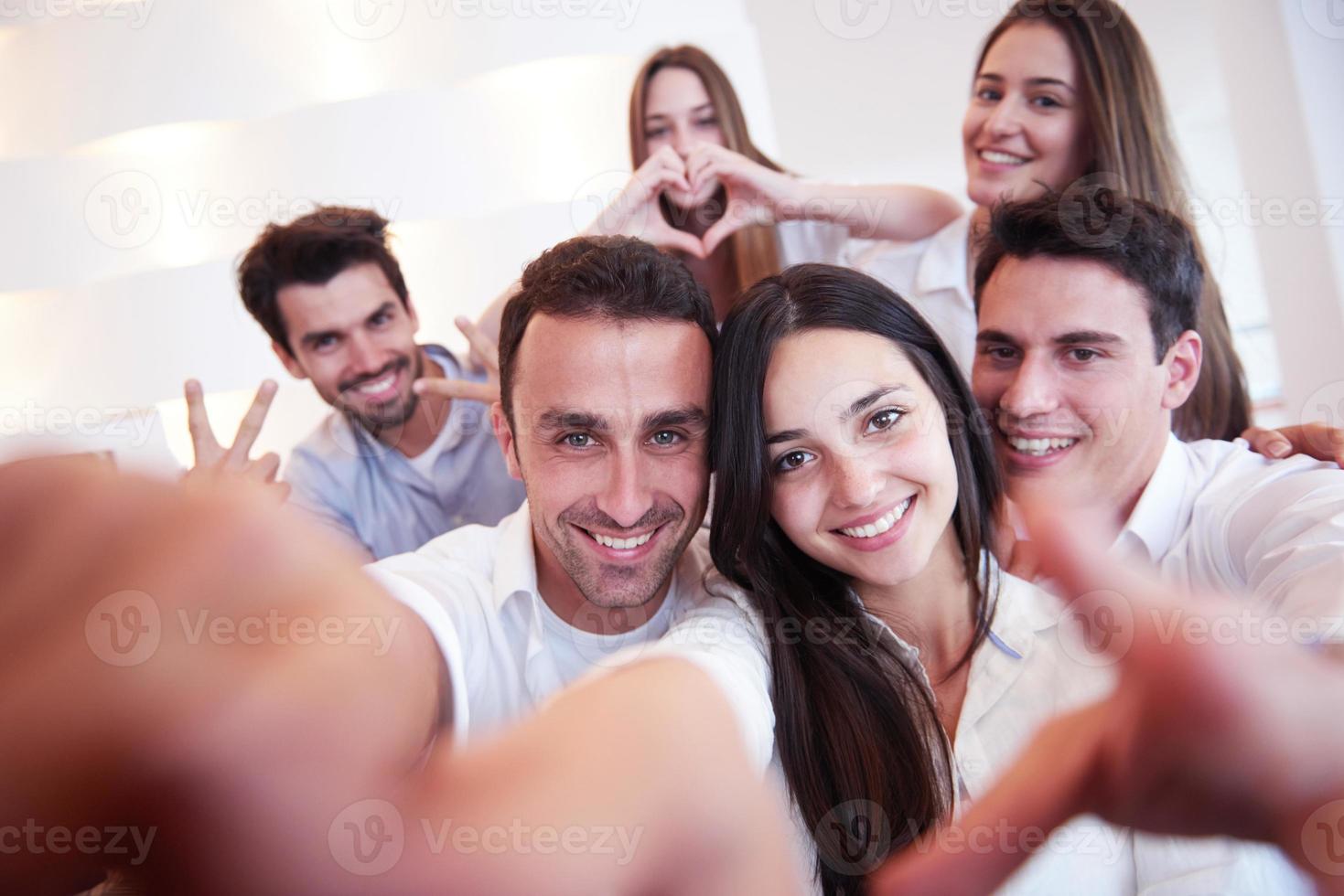 group of friends taking selfie photo