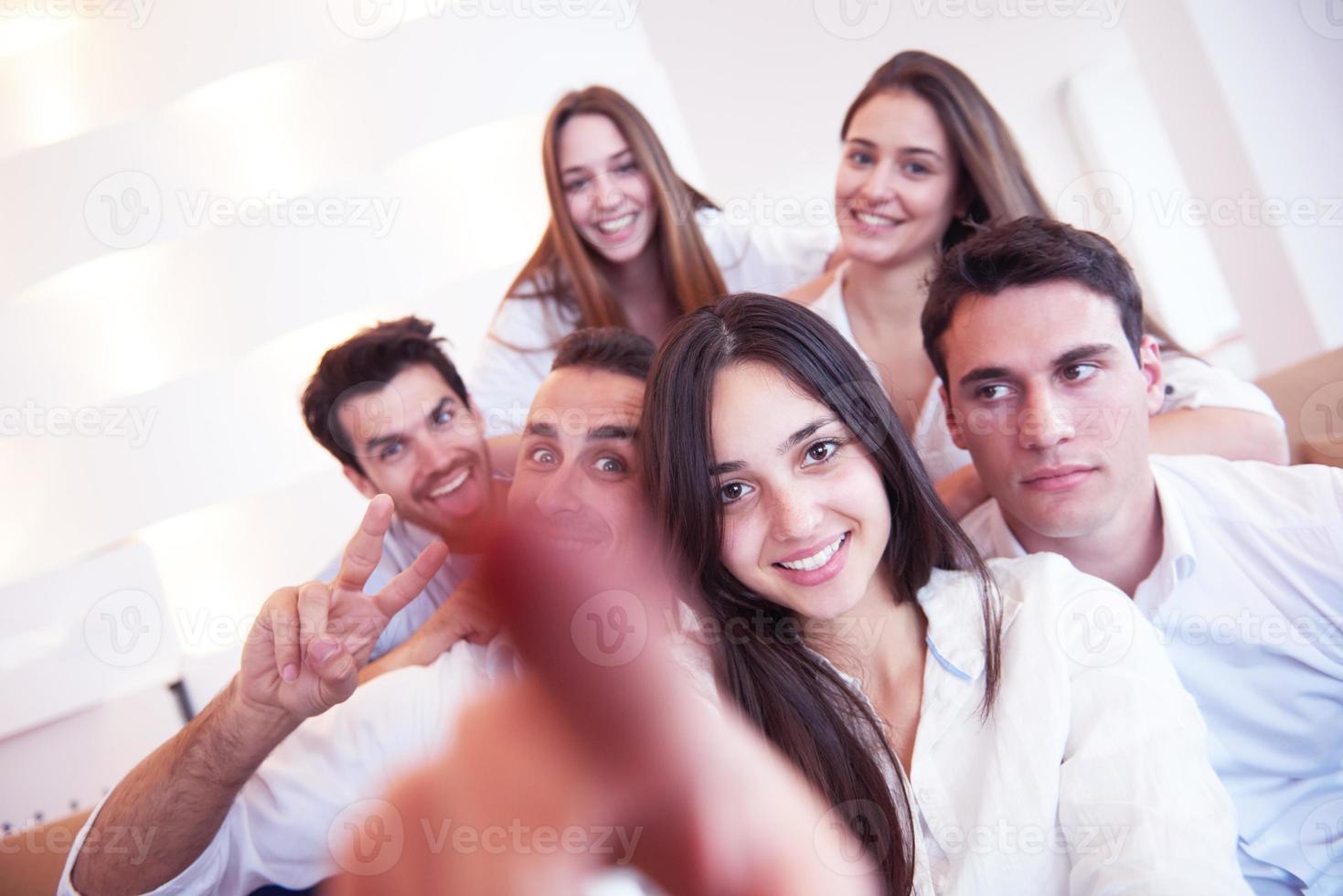 group of friends taking selfie photo