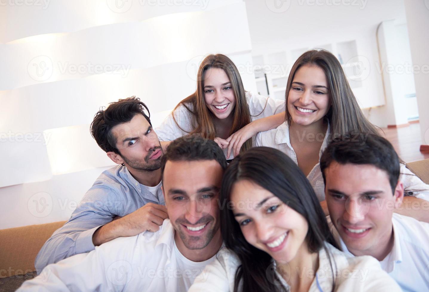 group of friends taking selfie photo