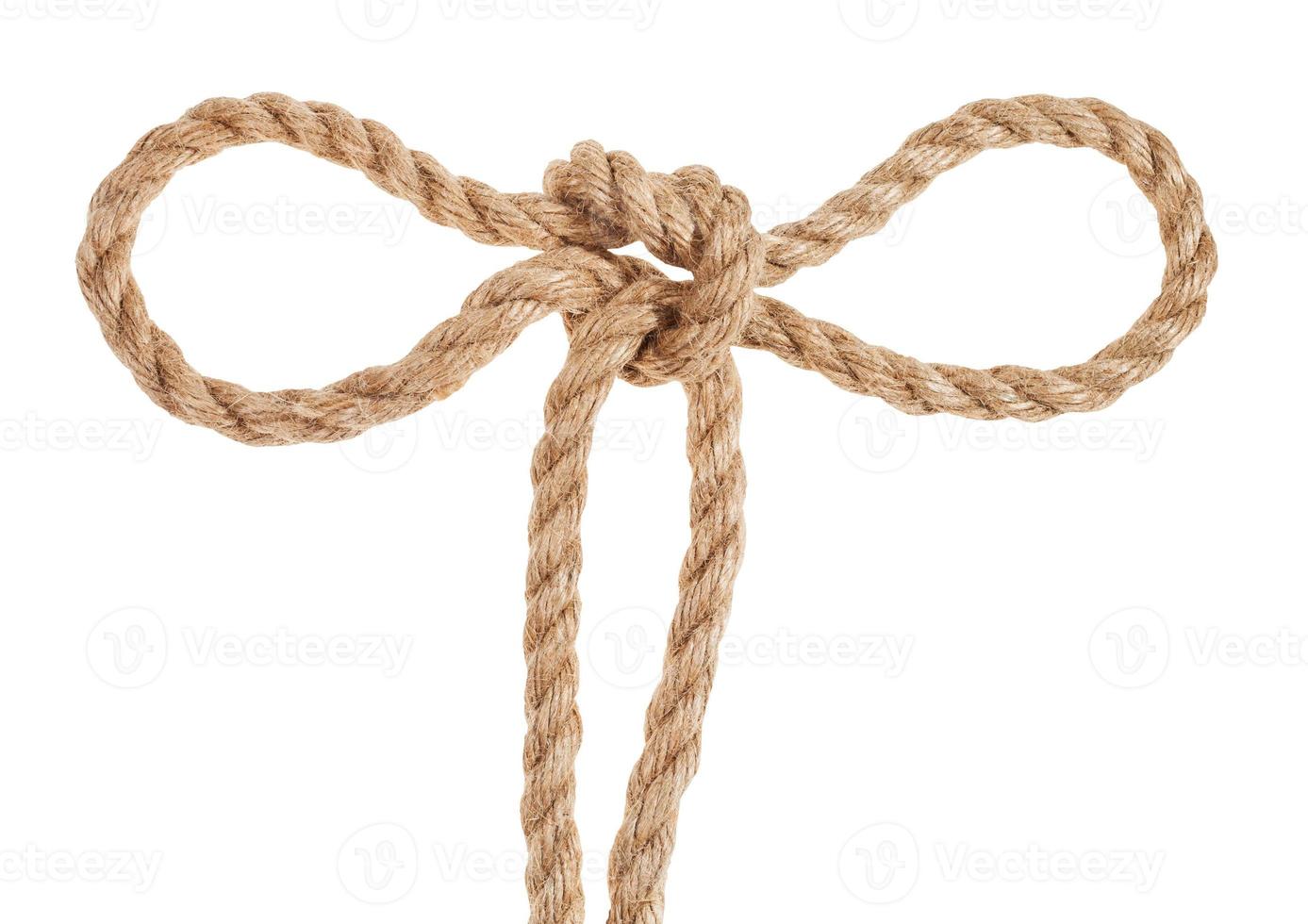 tom fool's knot tied on thick jute rope isolated photo