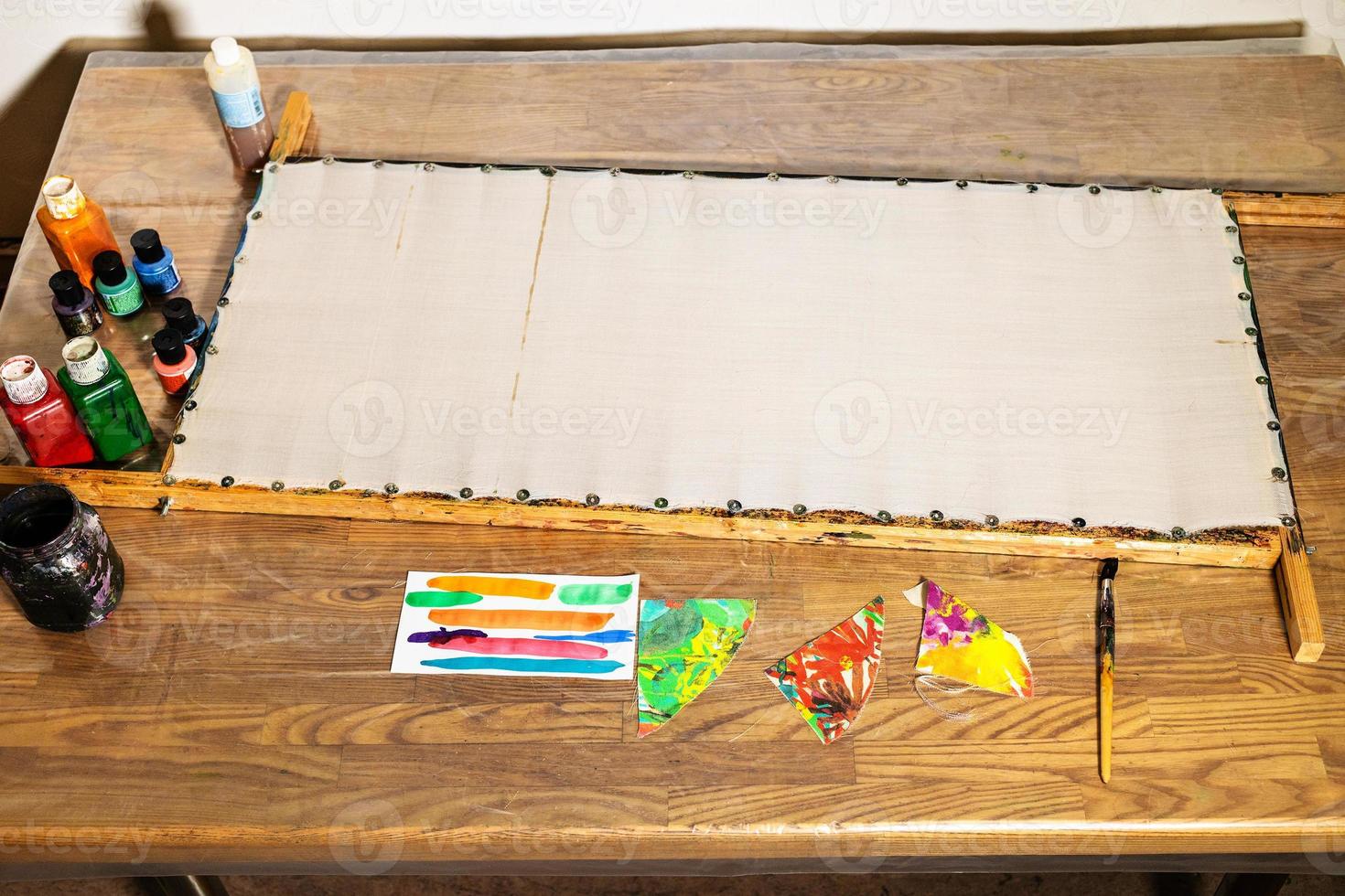 clean cloth stretched on wooden frame for batik photo