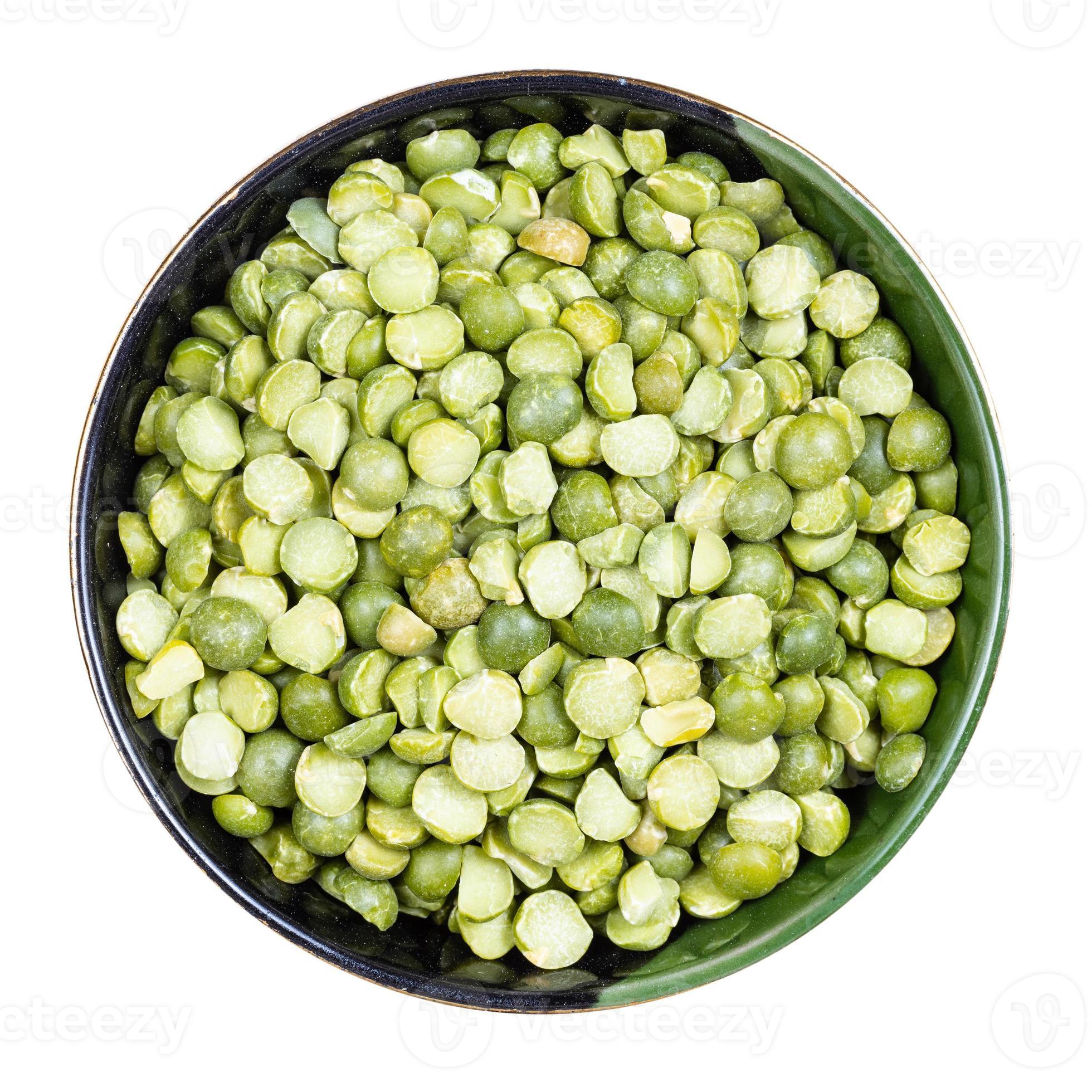 raw dried green split peas in round bowl isolated 10831630 Stock Photo