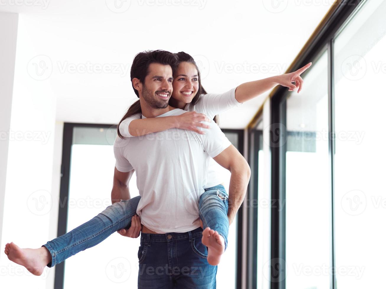 happy young romantic couple have fun and  relax at home indoors photo