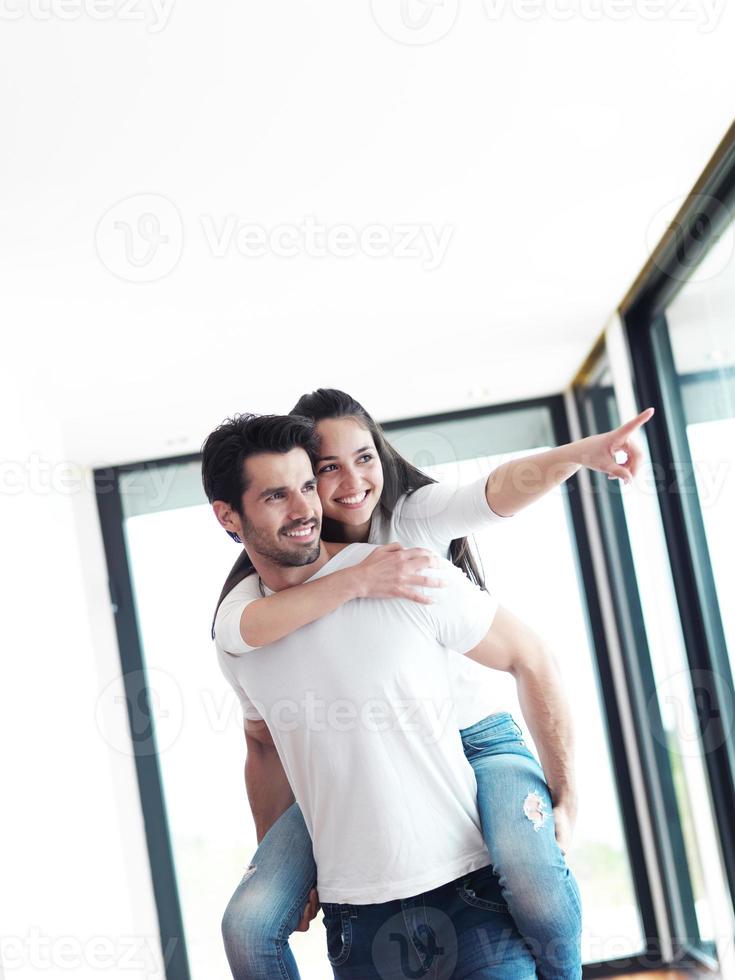 happy young romantic couple have fun and  relax at home indoors photo