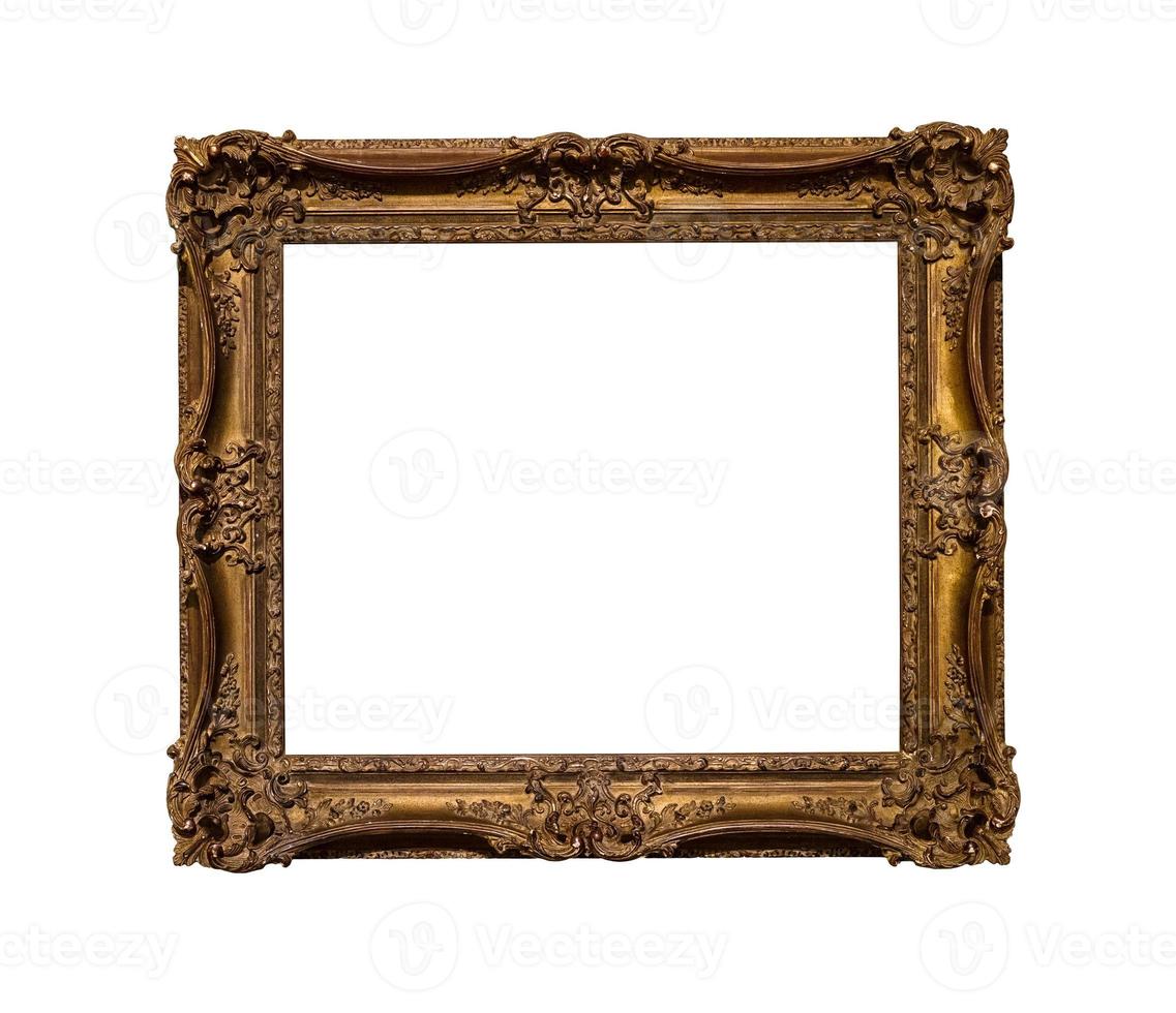 ancient dark ornamental picture frame isolated photo