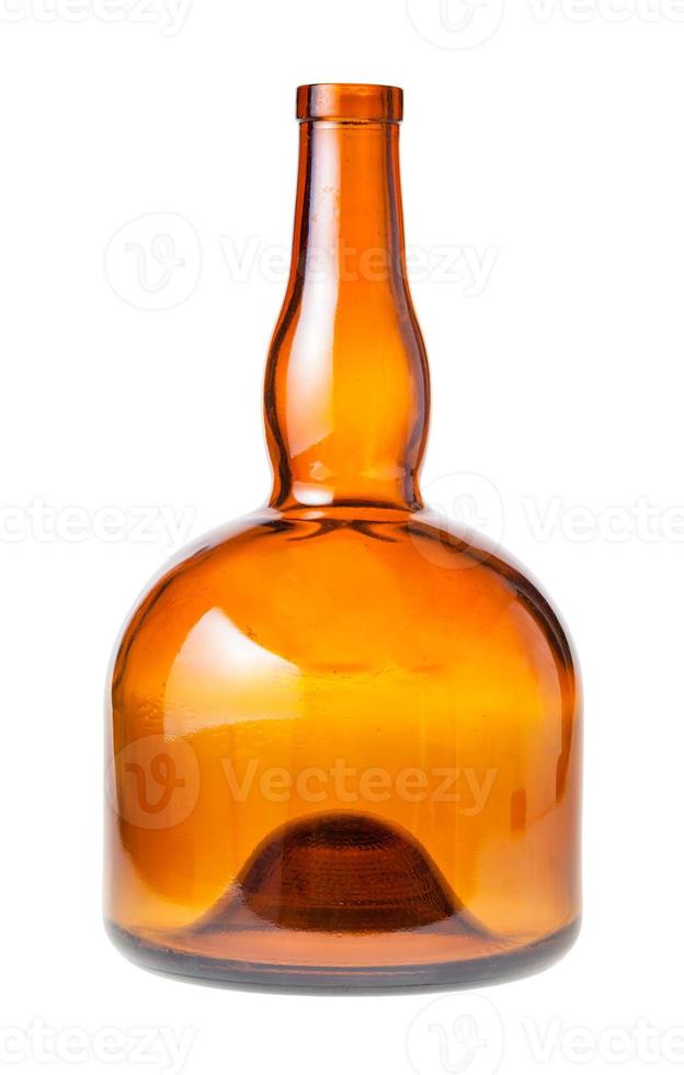 empty wide brown liquor bottle isolated on white photo