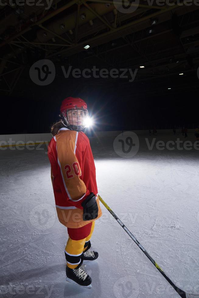 jovencita jugador de hockey sobre hielo retrato foto