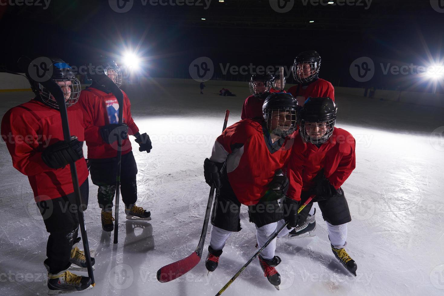 happy children gropu  hockey team sport players photo