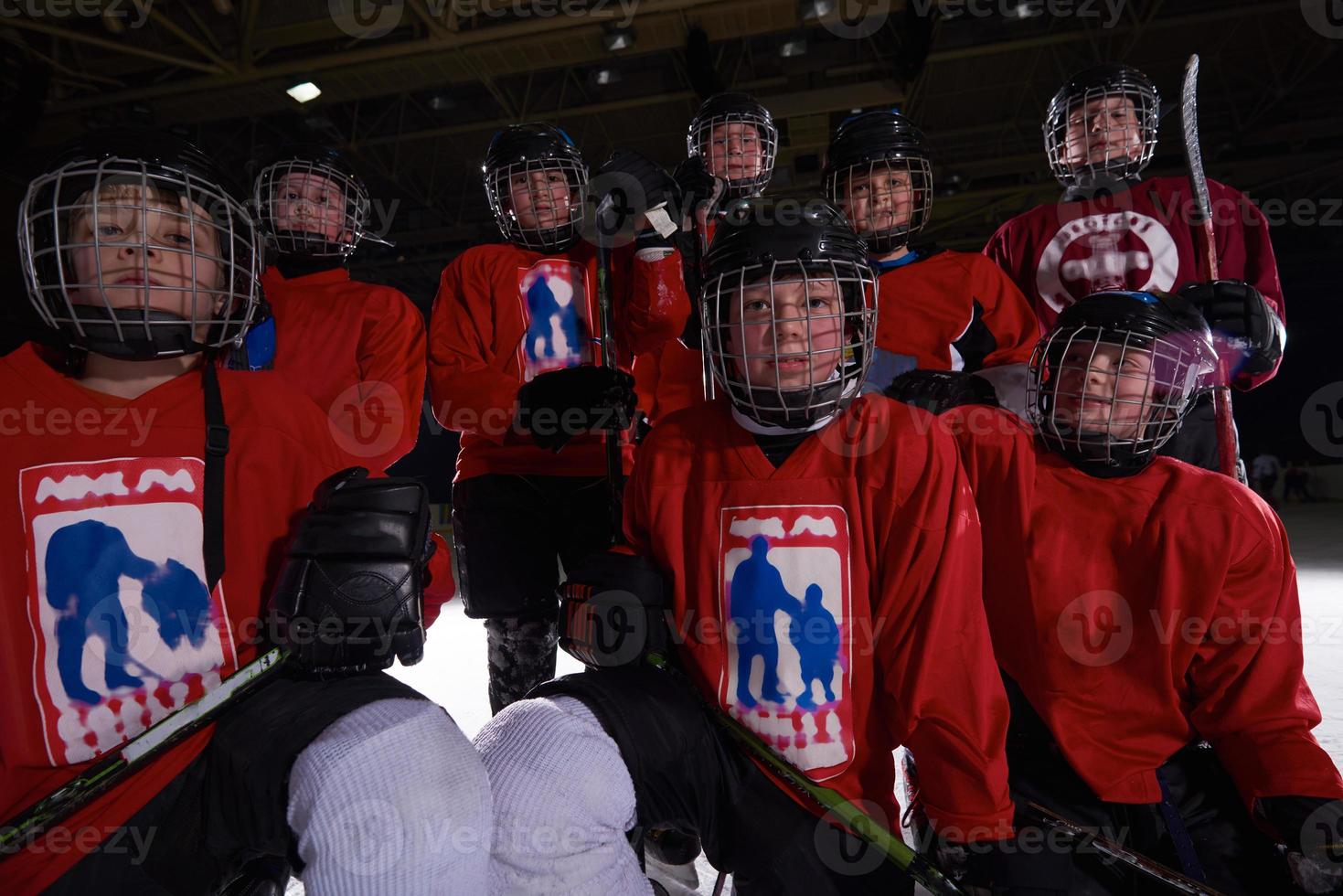 happy children gropu  hockey team sport players photo