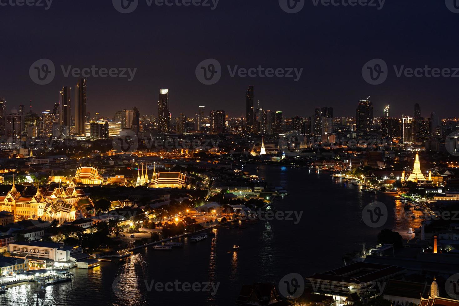 Cityscape of Bangkok at Twilight with View of Grand Palace and Chao Phraya River From Above photo