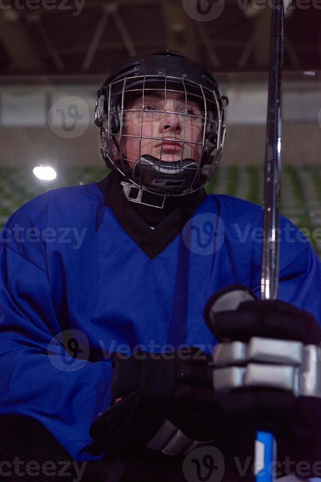 ice hockey players on bench photo