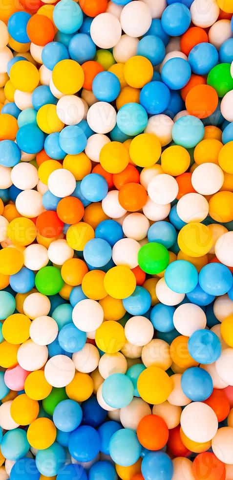 plastic color balls on children playground in a mall photo