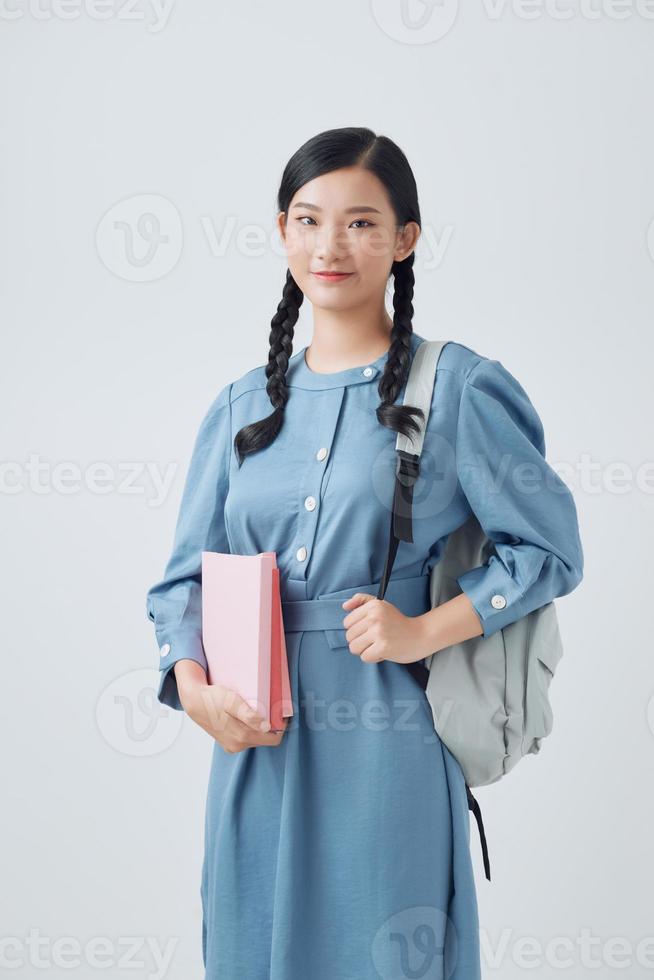 Portrait of attractive cute young student girl. photo