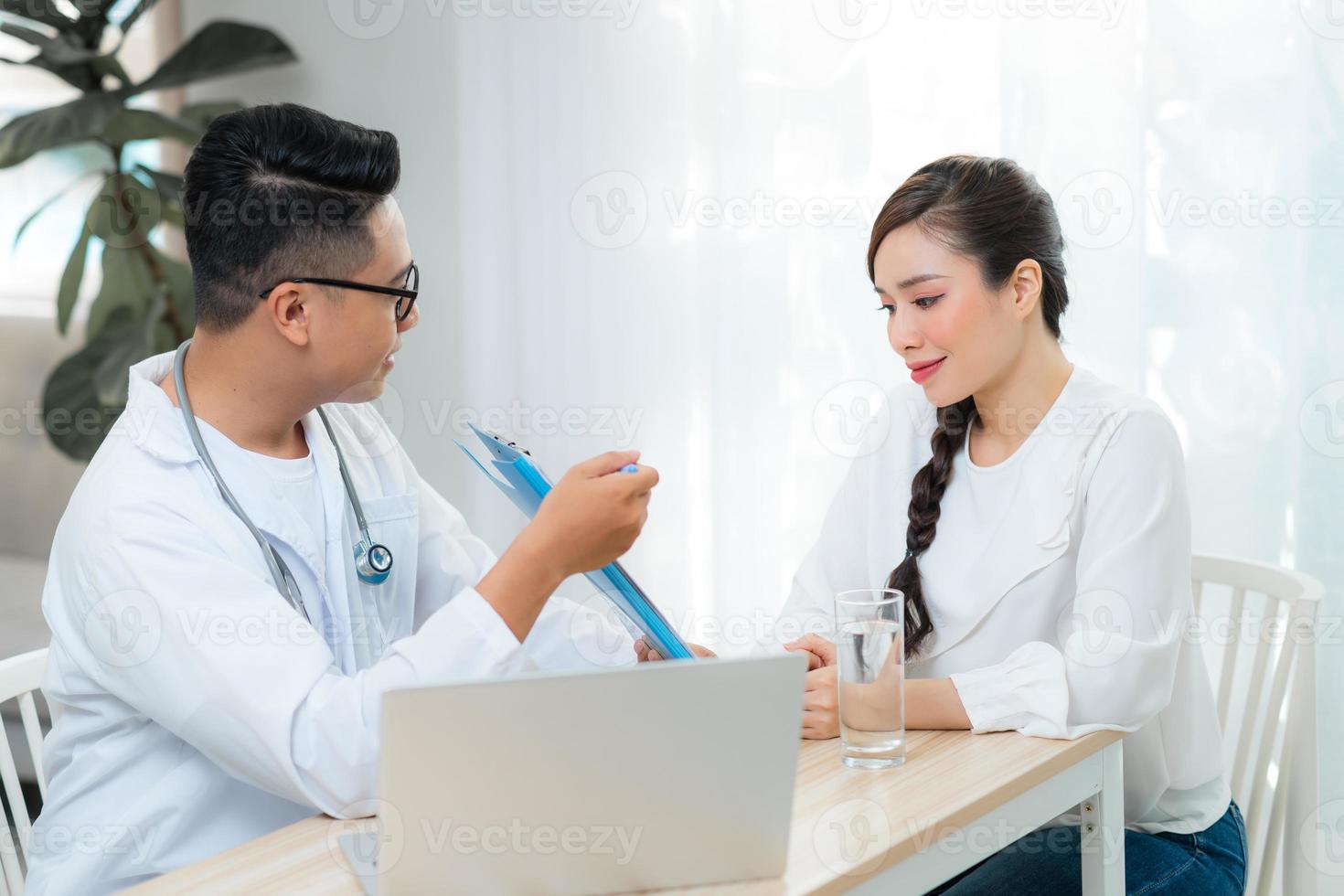 Healthcare concept of Obstetrician-gynecologist doctor consult with young woman about her health in clinic or hospital. photo