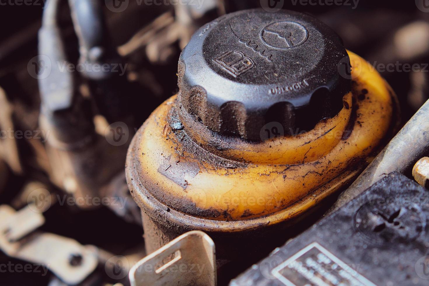 Dirty engine oil stains that have not been maintained. The concept of engine dirt can cause engine failure. photo