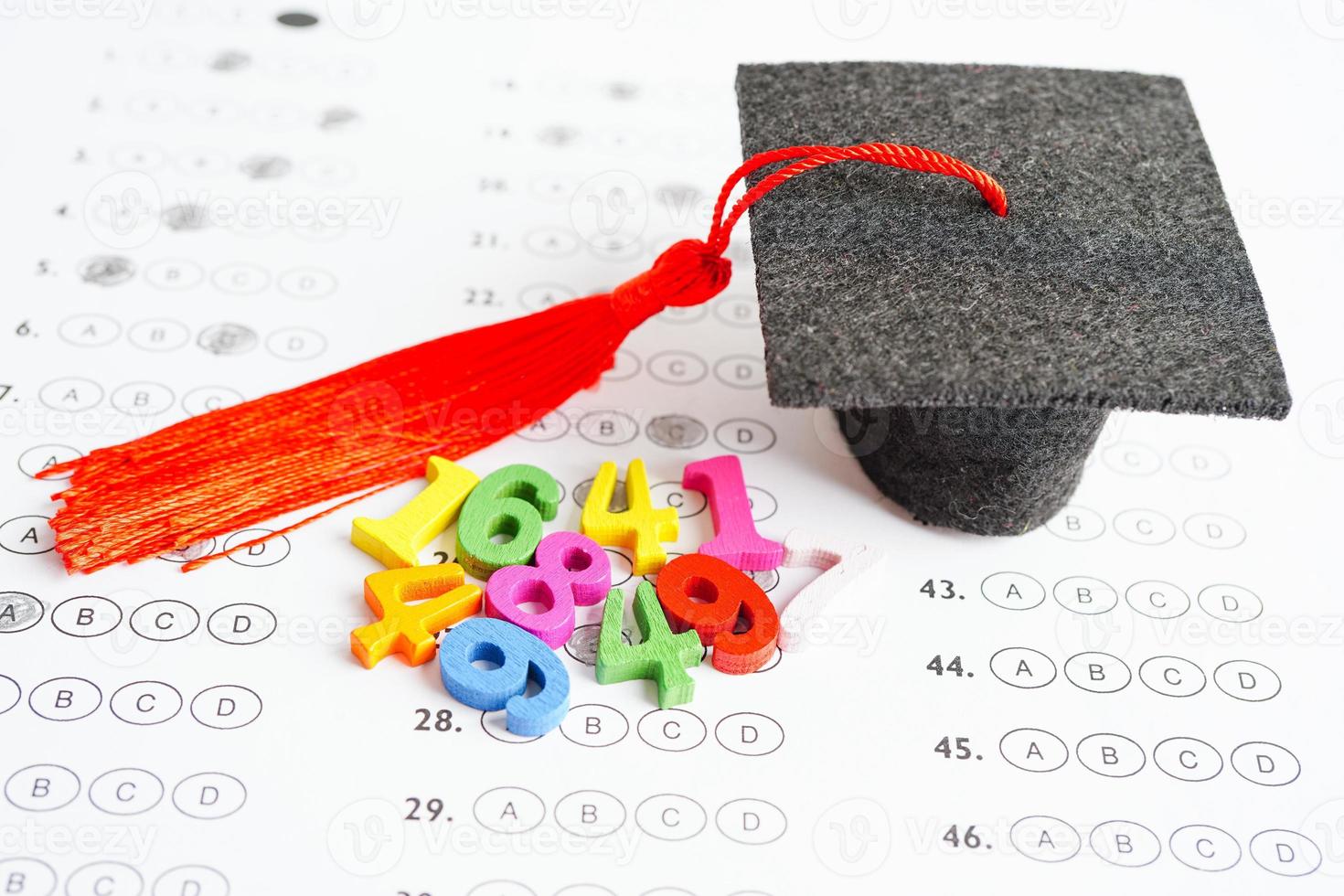 Math number with graduation gap hat on answer sheet test choice for learning Mathematic, education math concept. photo