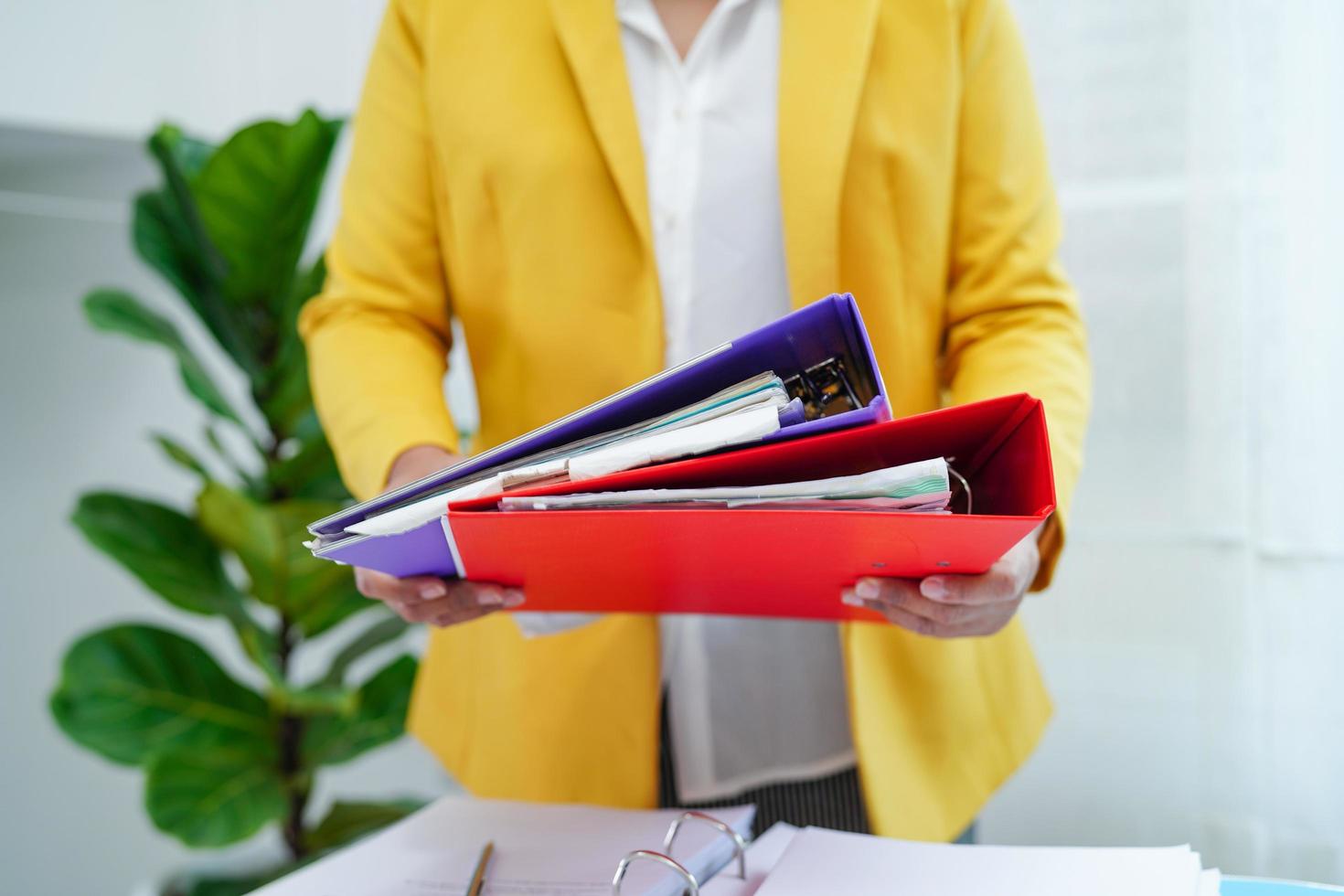 Business woman busy working with documents in office. photo
