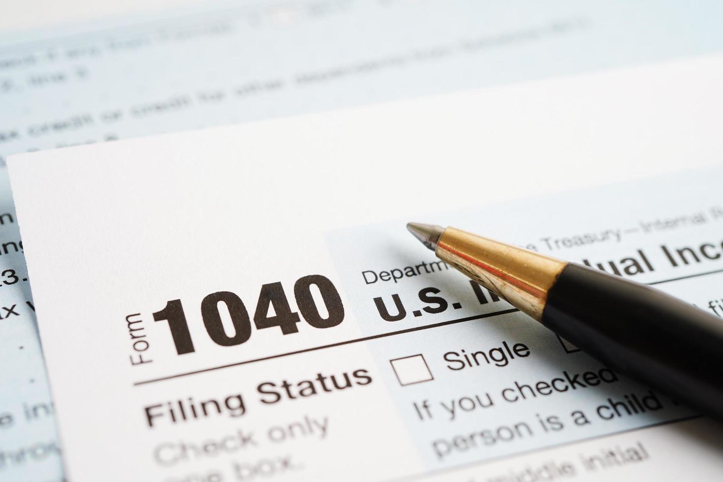 Tax form 1040 U.S. Individual Income Tax Return, business finance concept. photo