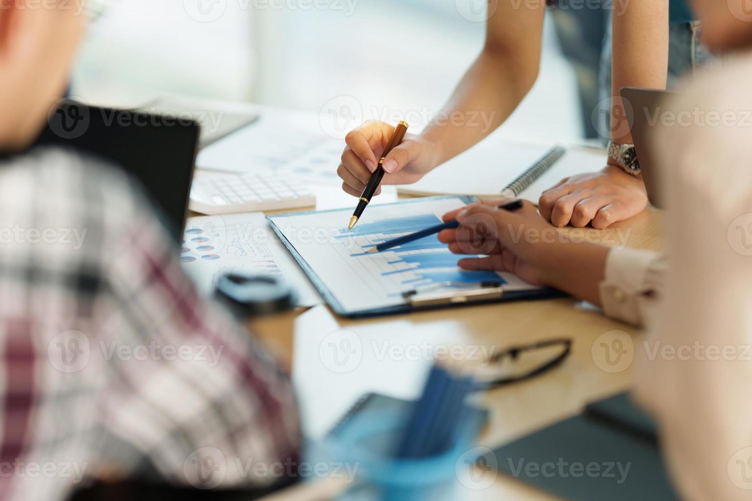 Group of Businesswoman and Accountant checking data document on digital tablet for investigation of corruption account. Anti Bribery concept. photo