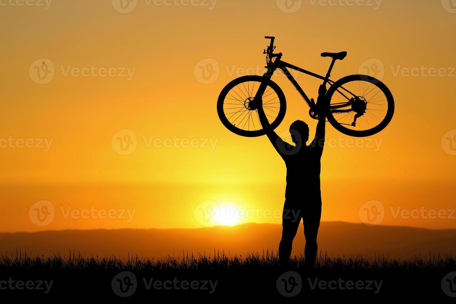 Silhouettes of bikes and cyclists travel concept and exercise by bicycle photo